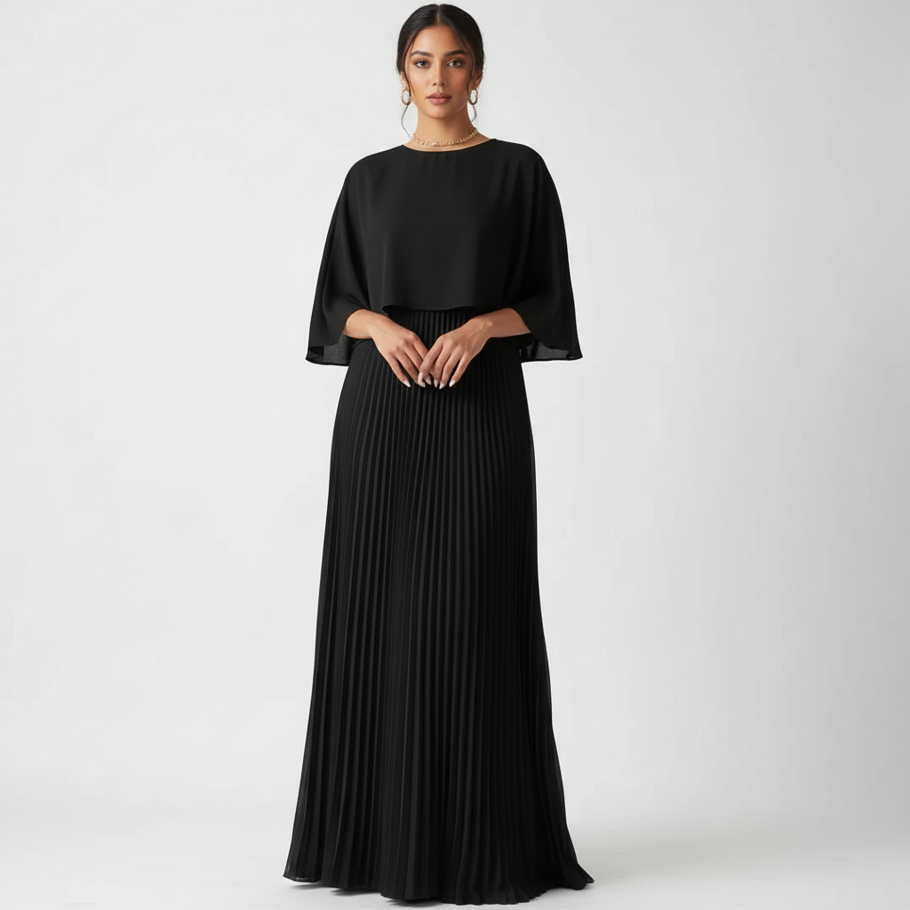 Floor-length wedding guest gown with elegant cape detail and a flattering pleated skirt.