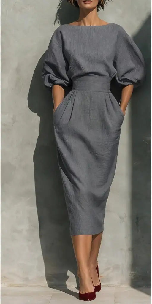 Elegant belted midi dress for women, featuring puff sleeves, ideal for wedding guests & sophisticated parties.