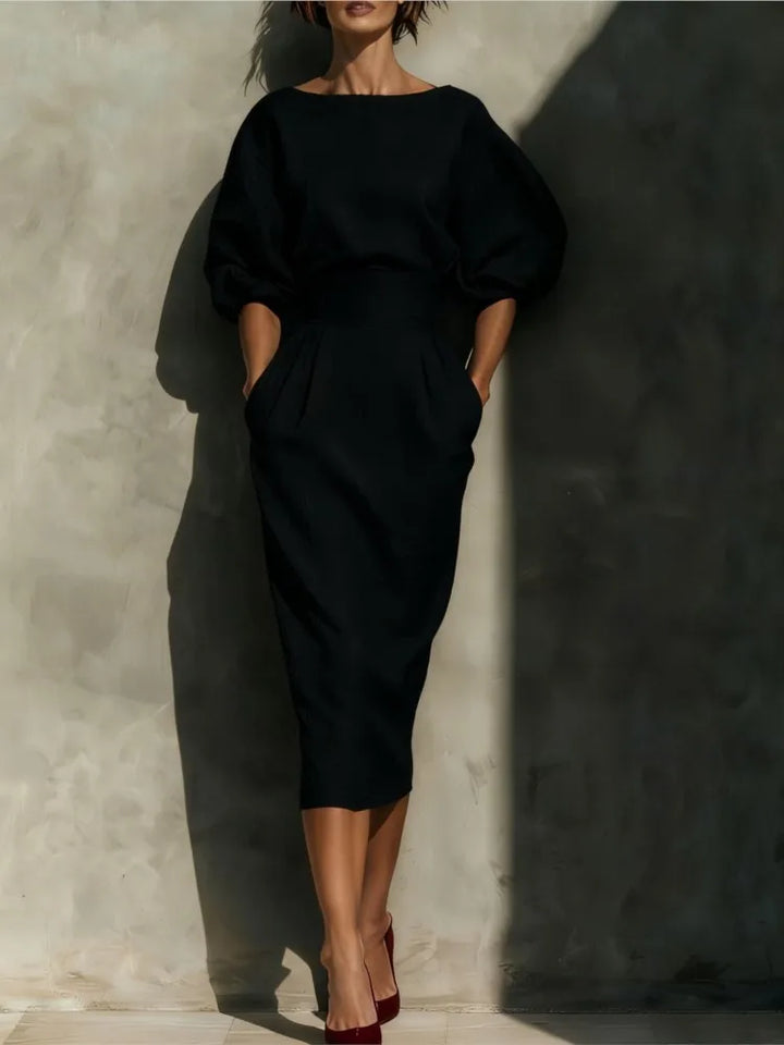 Women's elegant midi dress with puff sleeves & belt, a chic choice for formal events and special occasions.