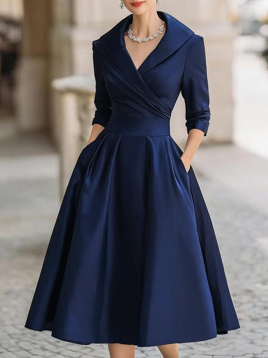 Stylish women's midi dress for wedding guests, featuring a chic draped collar and flowing flared skirt for elegant parties.