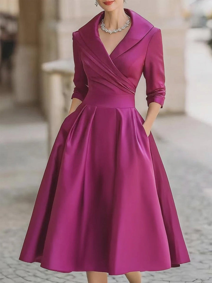 Chic women's party midi dress featuring a draped collar, three-quarter sleeves, and a flared skirt; ideal for special events.