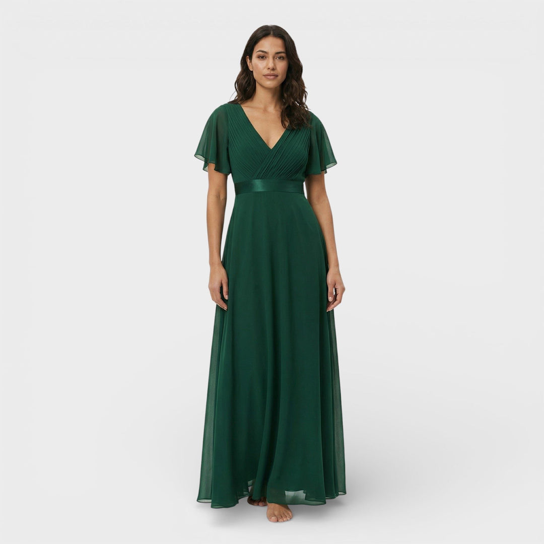 Sophisticated long pleated maxi dress for women, featuring a flattering V-neck and flutter sleeves.