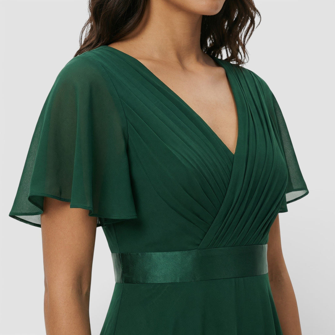 Stylish women's formal evening dress, a pleated maxi with V-neck, ideal for special occasions.