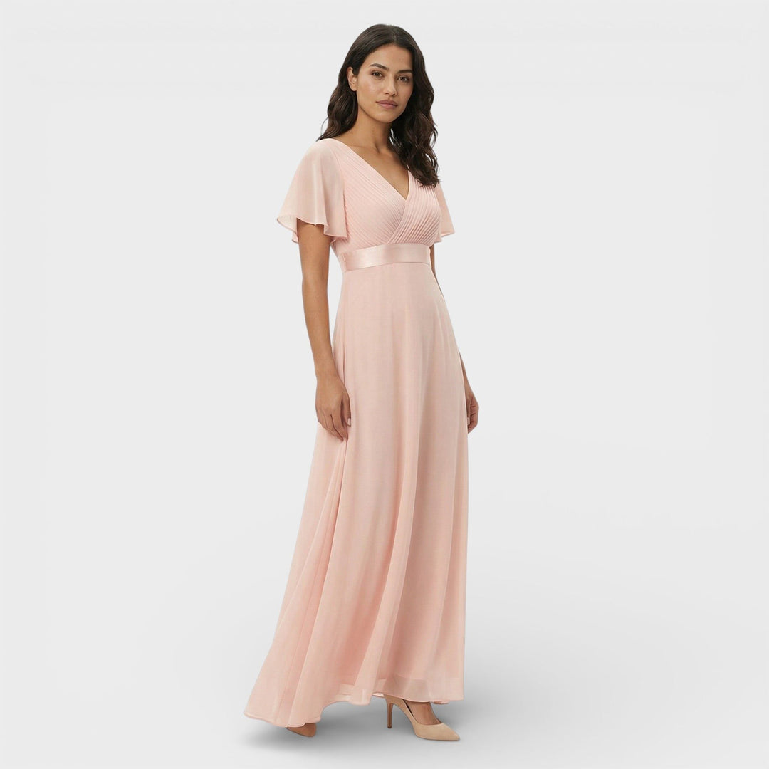Graceful green wedding guest V-neck maxi dress, featuring elegant pleats and flutter sleeves.