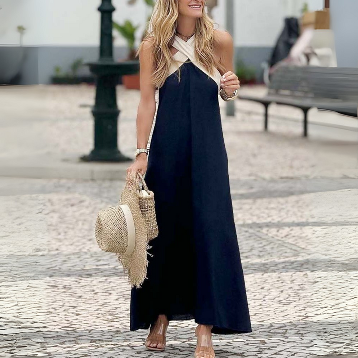 Women's halter-neck summer dress, an elegant and casual choice for beach and day wear.