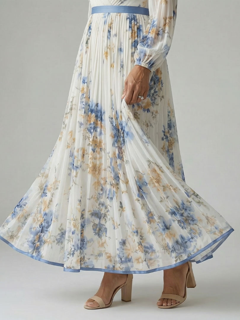 Rear view of a women's white floral midi wrap dress, showcasing the flattering fit and elegant pleated skirt.