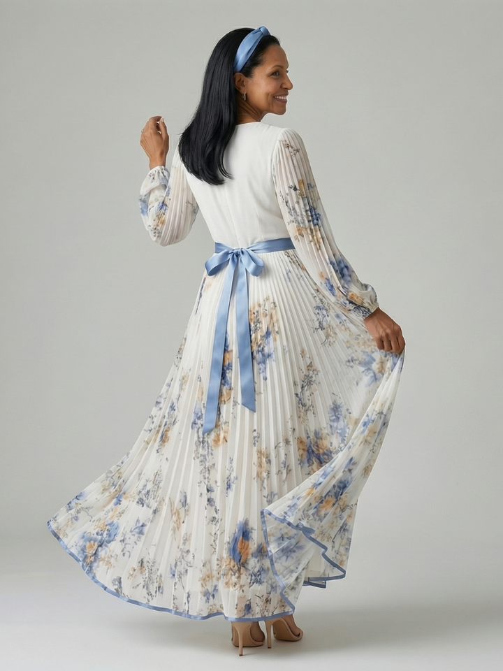 Versatile white floral long sleeve midi wrap dress for women, suitable for daytime wear or elegant special occasions.