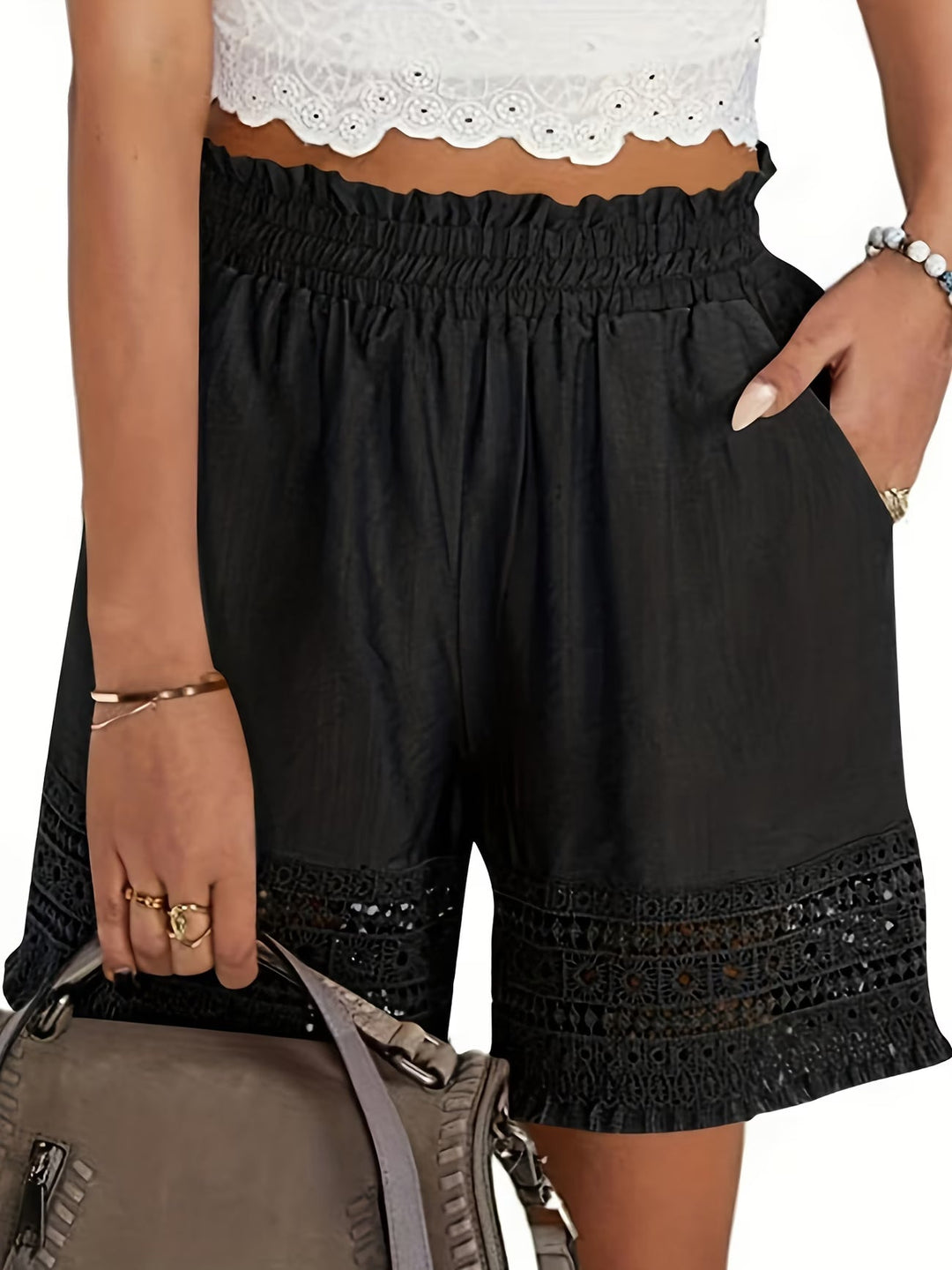 Chic women's tailored shorts with lace detail and functional slant pockets, ideal for day-to-night summer fashion.
