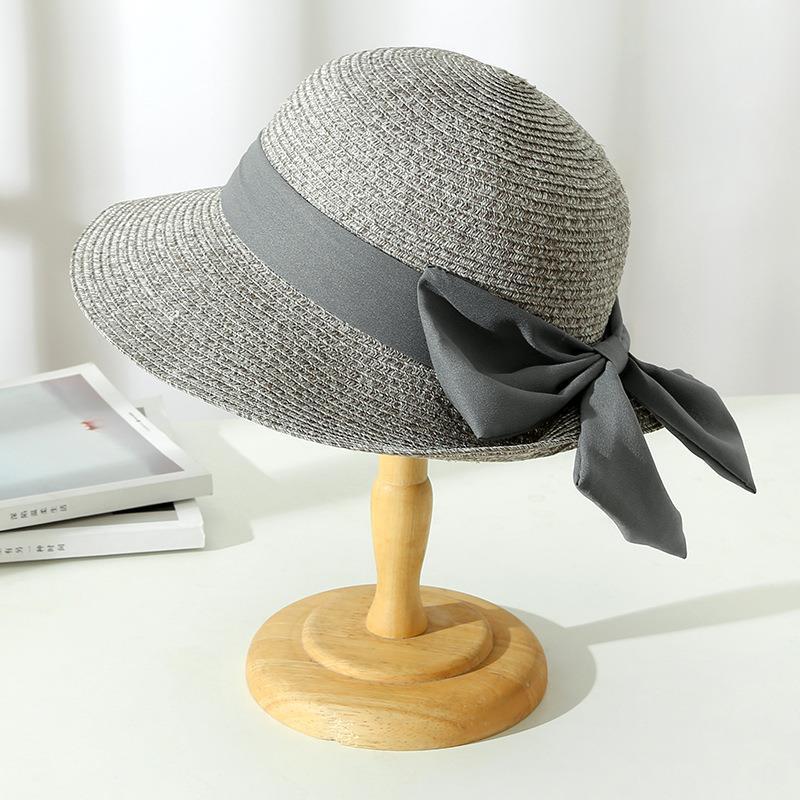 Summer fashion wide brim straw hat for women, perfect vacation accessory for beach & sun.