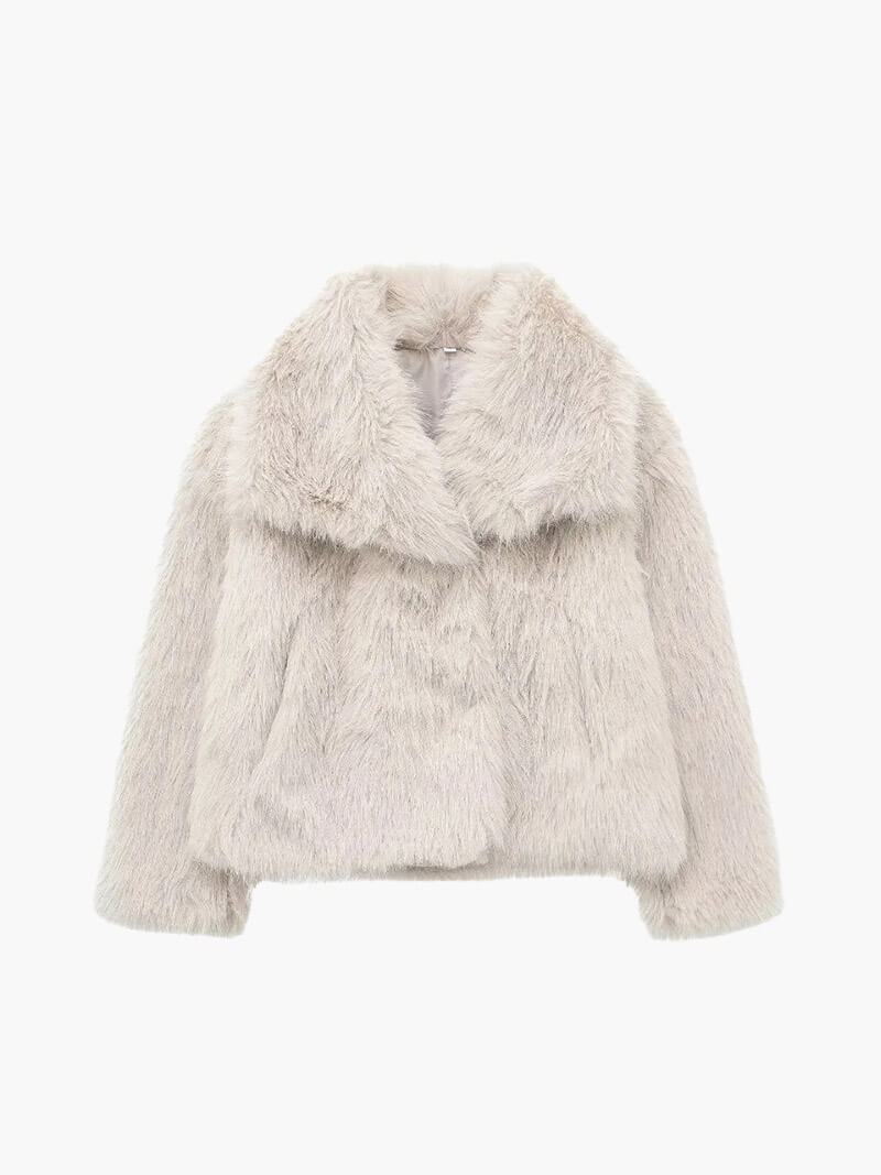 Elegant women's wide lapel winter coat, classic style perfect for cold weather & warmth.