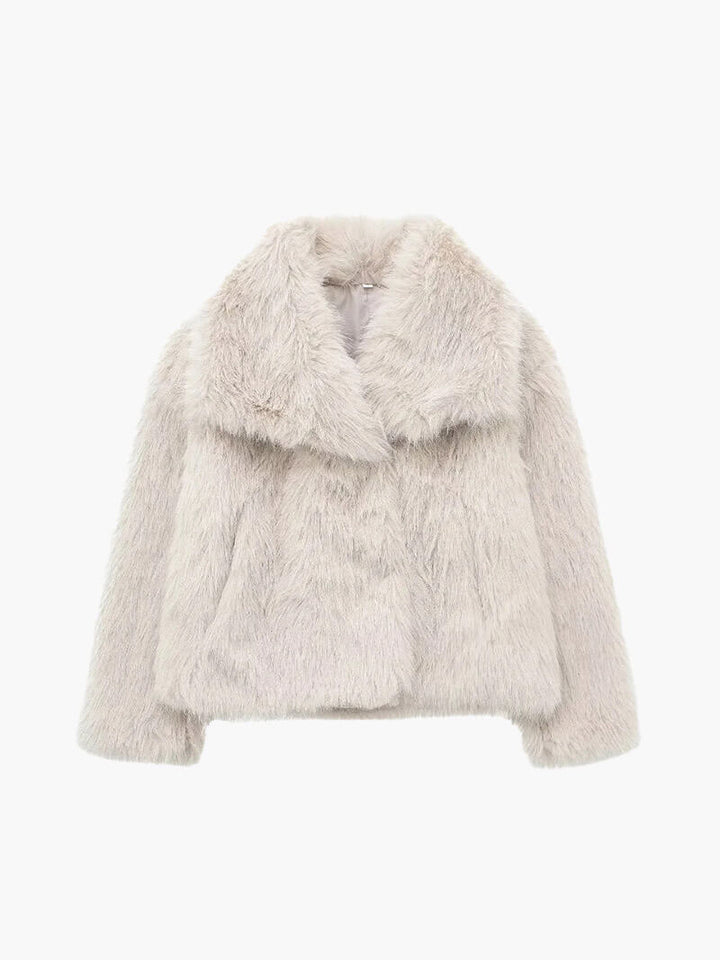 Elegant women's wide lapel winter coat, classic style perfect for cold weather & warmth.