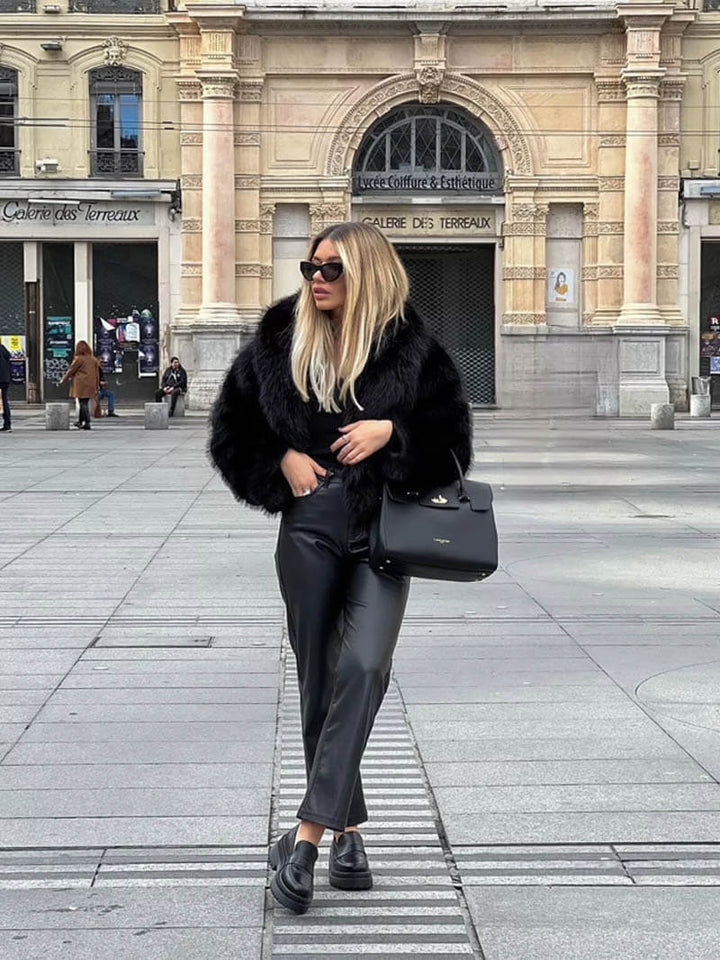 Stylish women's wide lapel winter jacket, offering an elegant classic design for warmth in cold weather.
