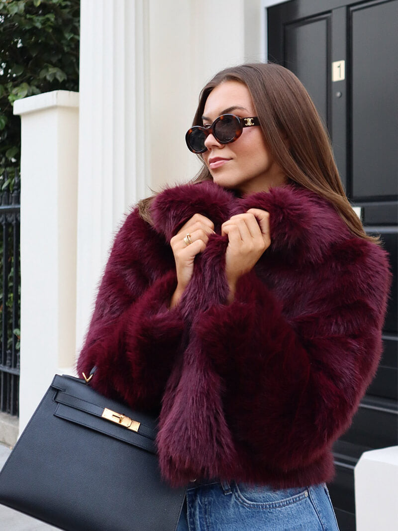 Classic women's winter coat, elegant wide lapel design ensuring warmth, style, and a timeless look.
