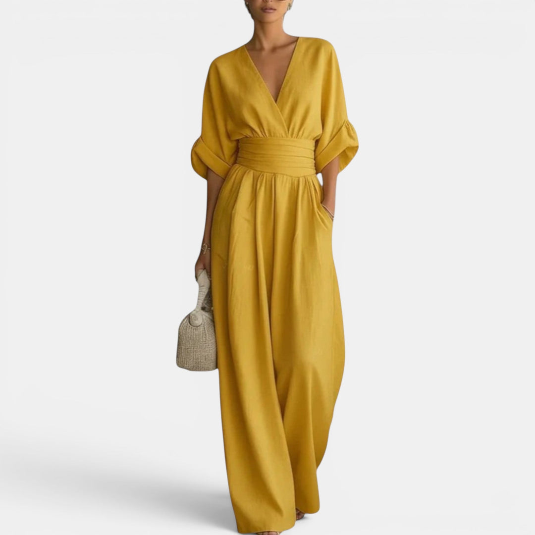 Stylish women's wide-leg jumpsuit dress. An elegant event outfit designed for comfort and modern fashion.