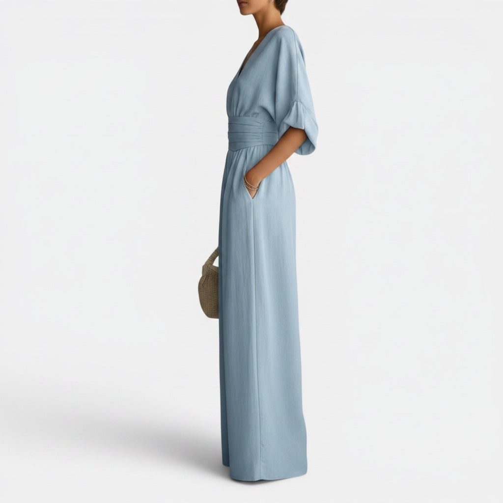 Elegant wide-leg jumpsuit dress for women. A comfortable, modern piece for your spring wardrobe and events.
