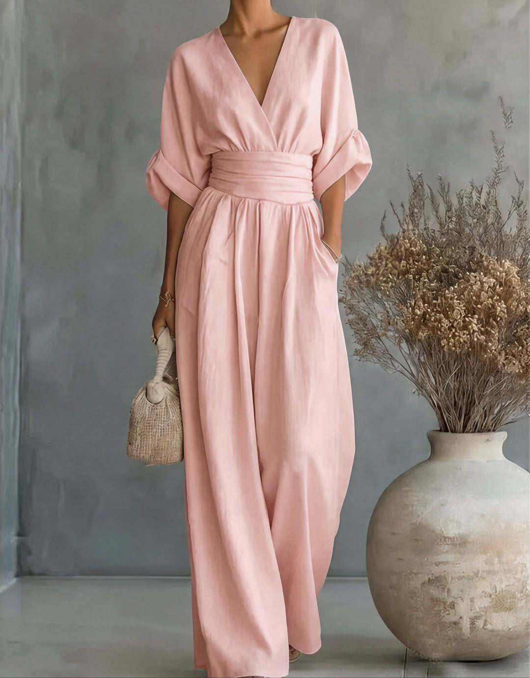 Modern wide-leg jumpsuit for women, stylish and sophisticated for any elegant event.