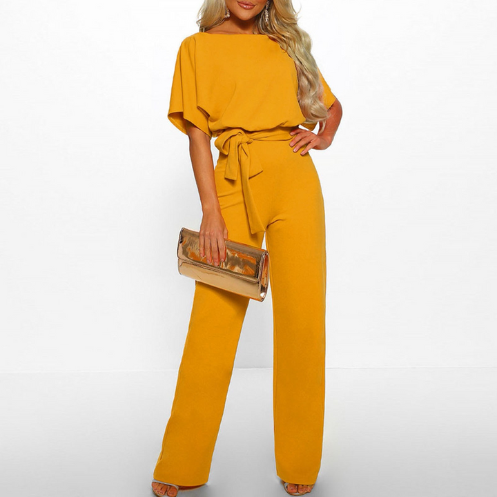 Sophisticated women's occasion wear: a wide leg jumpsuit with beautiful flutter sleeves.