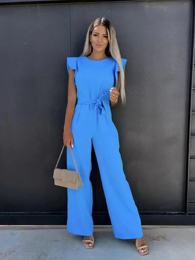 Elegant women's wide leg jumpsuit with chic tie waist and delicate ruffle sleeves, perfect for spring fashion.