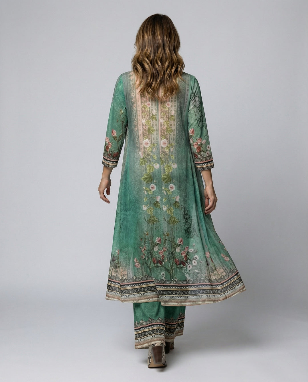 Stylish floral print jumpsuit for women featuring wide legs and an elegant shawl.