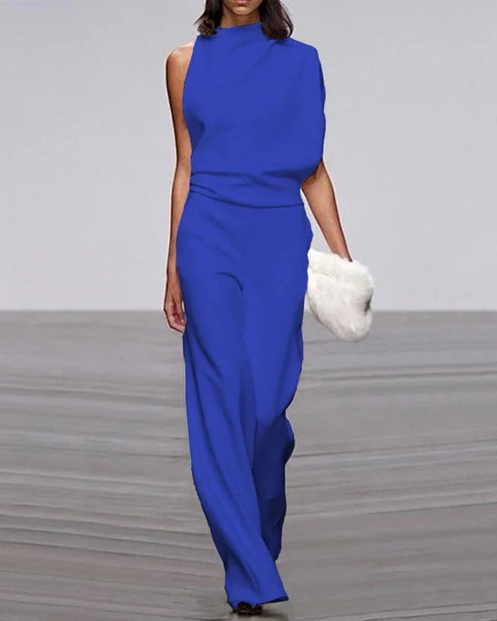 Fashionable women's sleeveless wide leg jumpsuit, elegant mock neck design. Perfect for sophisticated party wear.
