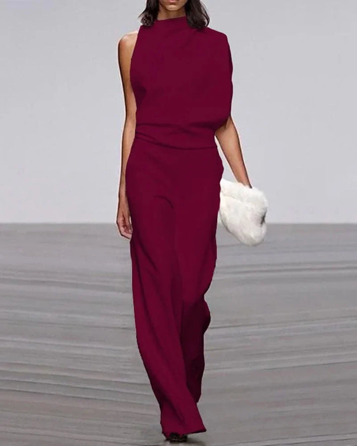 Chic women's wide leg jumpsuit, sleeveless mock neck. Elegant party or formal evening wear for women.