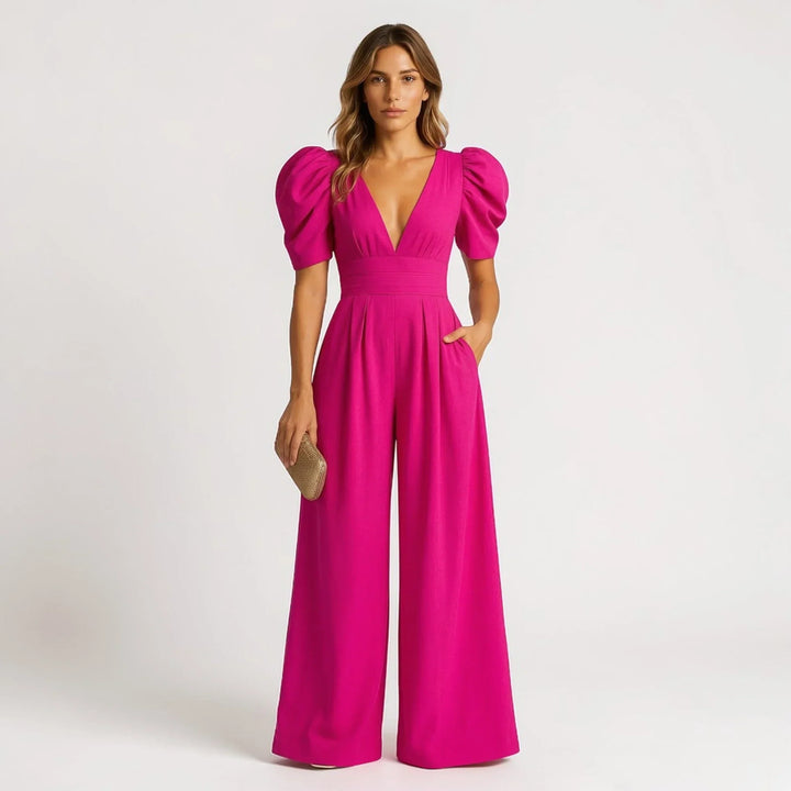 Bright yellow elegant women's wide-leg jumpsuit with puff sleeves, perfect for evening fashion.