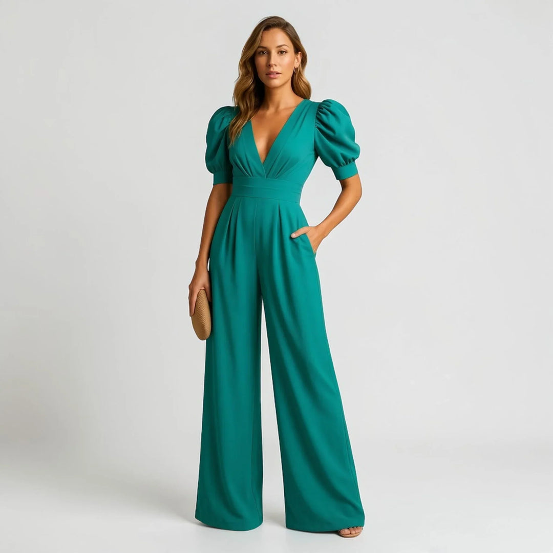 Pink women's wide-leg jumpsuit with elegant puff sleeves, a stylish choice for special occasion fashion.
