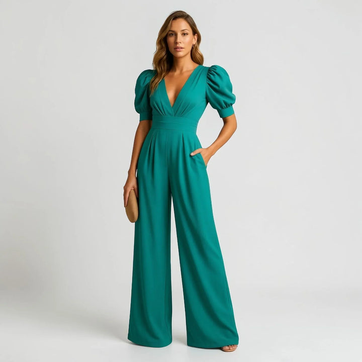 Pink women's wide-leg jumpsuit with elegant puff sleeves, a stylish choice for special occasion fashion.