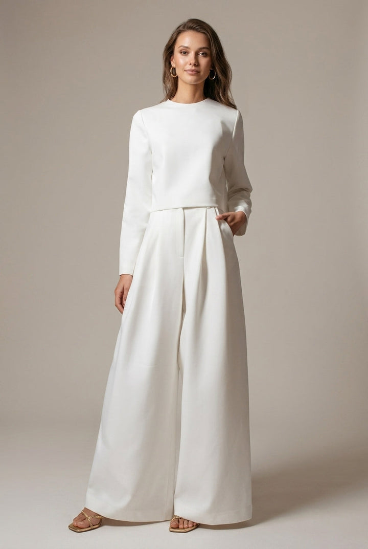 Elegant women's wide leg palazzo two-piece set, perfect for smart casual wear. Effortless long sleeve outfit.