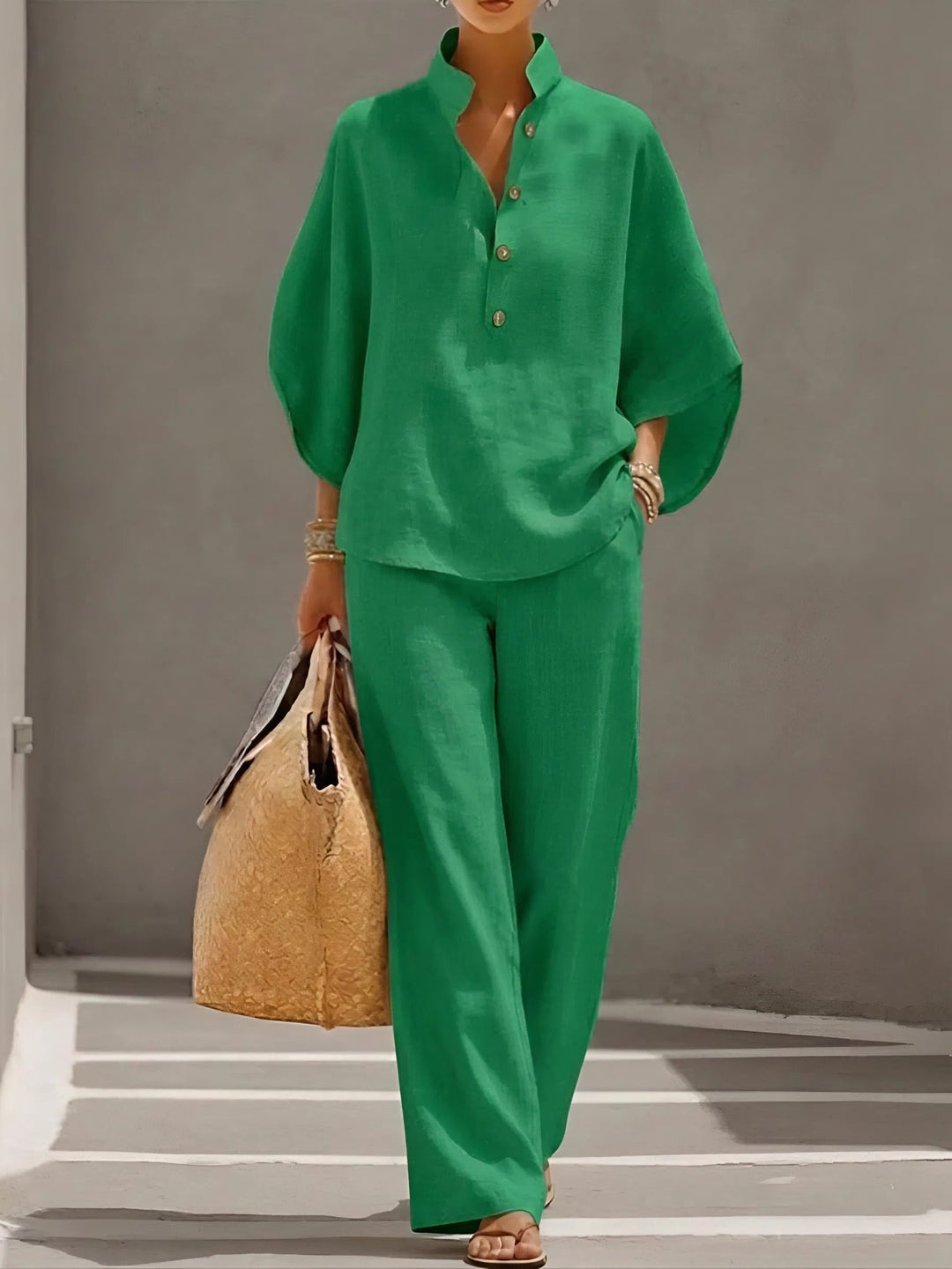 Classic women's wide sleeve trouser set, a versatile two-piece for effortless casual or elegant spring/summer wear.