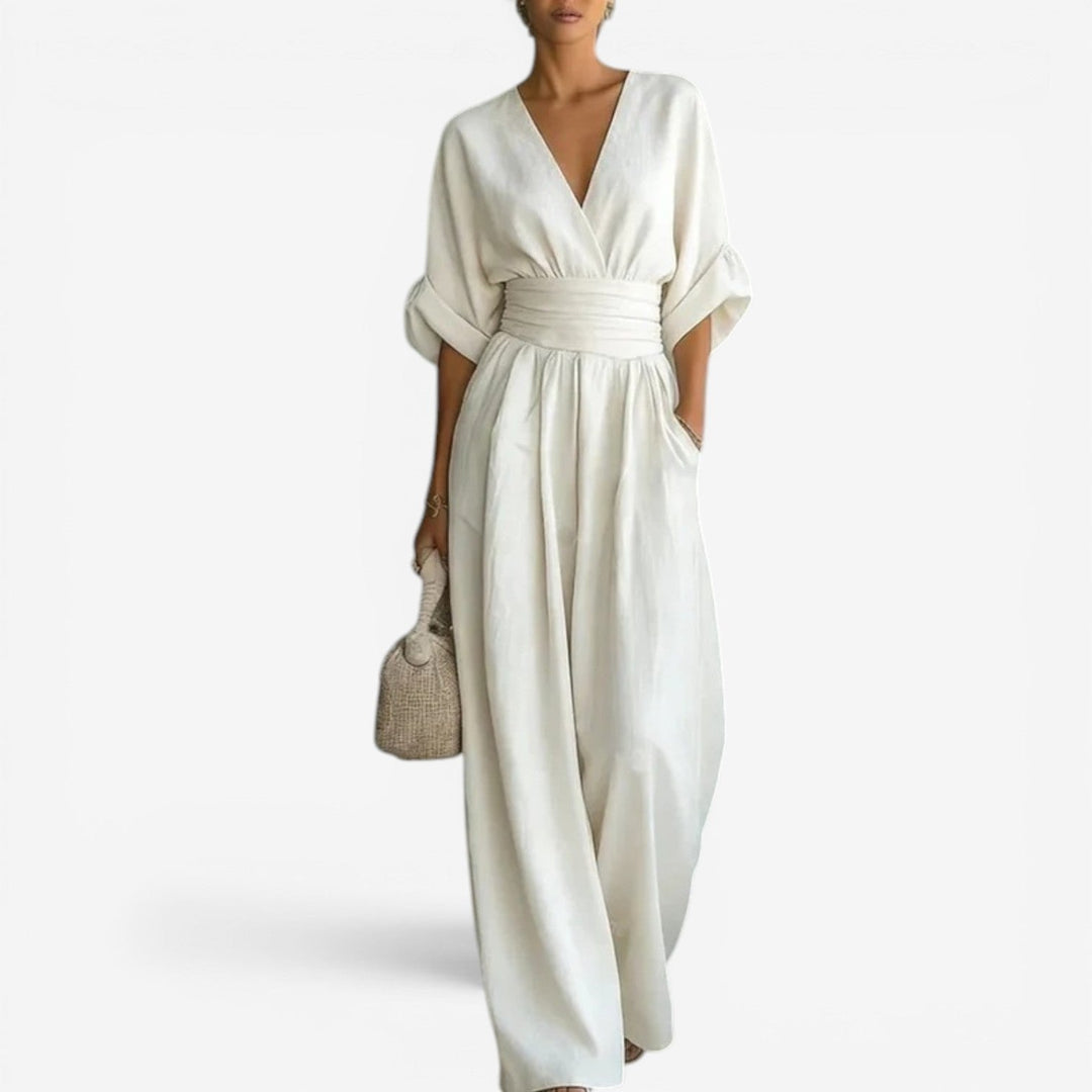 Stylish V-neck jumpsuit for women, featuring chic wide sleeves & a comfortable flowy fit for any event.