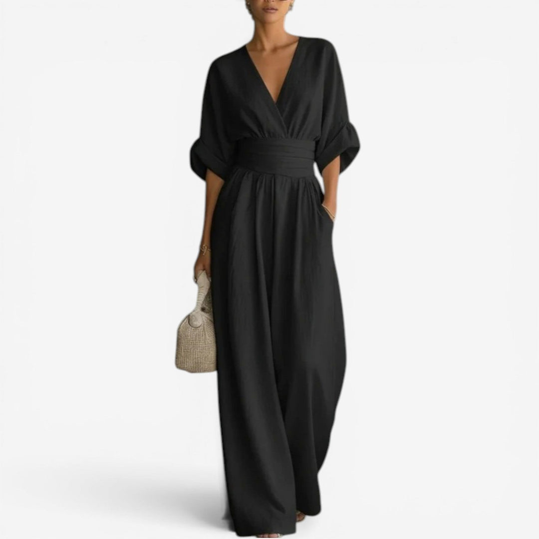 Chic elegant women's V-neck jumpsuit with wide sleeves, a versatile piece for sophisticated casual or brunch wear.