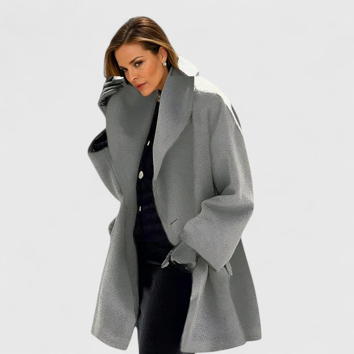 Ladies' elegant long winter coat for versatile, warm everyday wear. Classic style, perfect for layering.