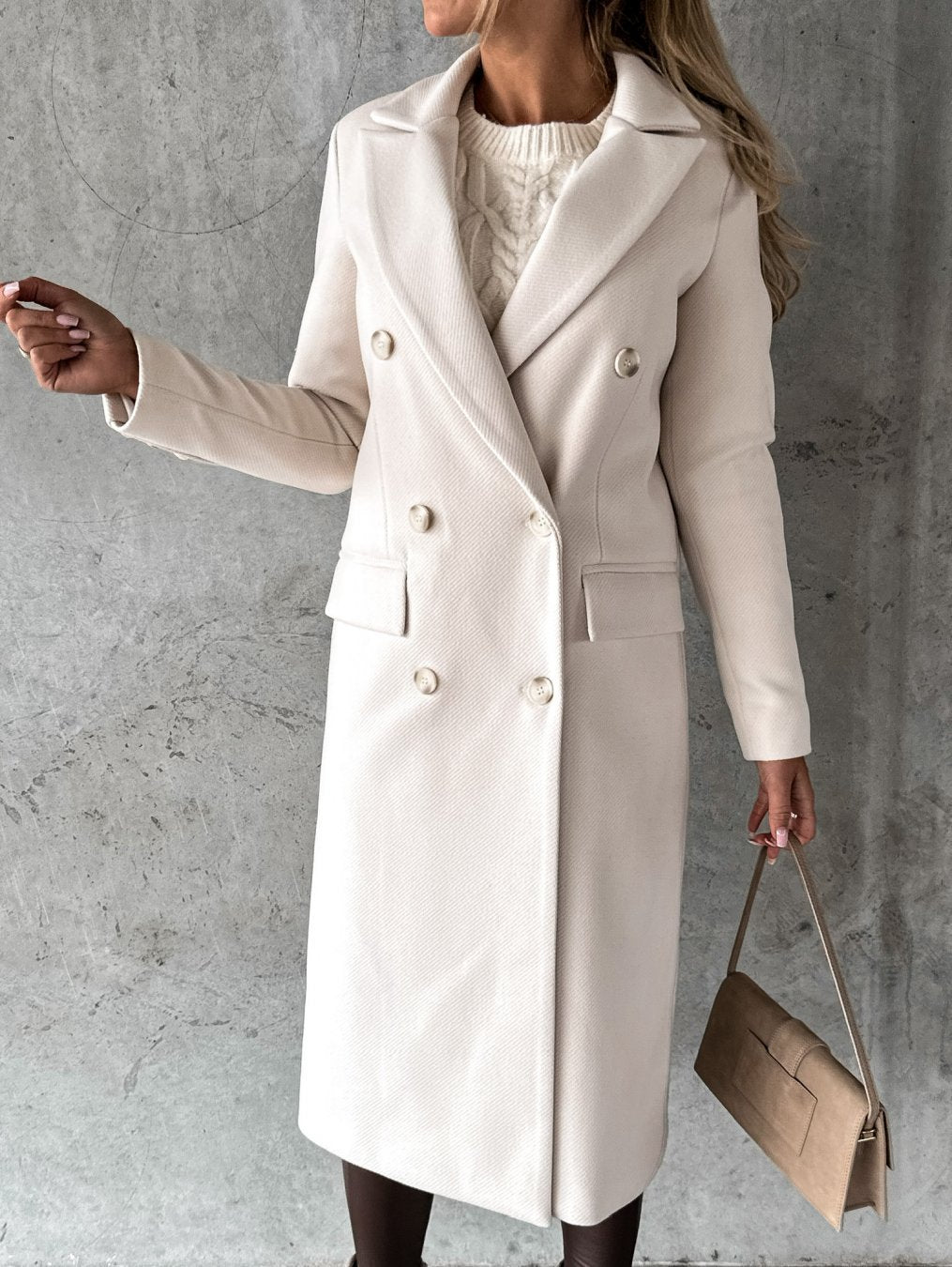 Chic black women's winter jacket, combining warmth with elegant style. Essential long-sleeve outerwear.