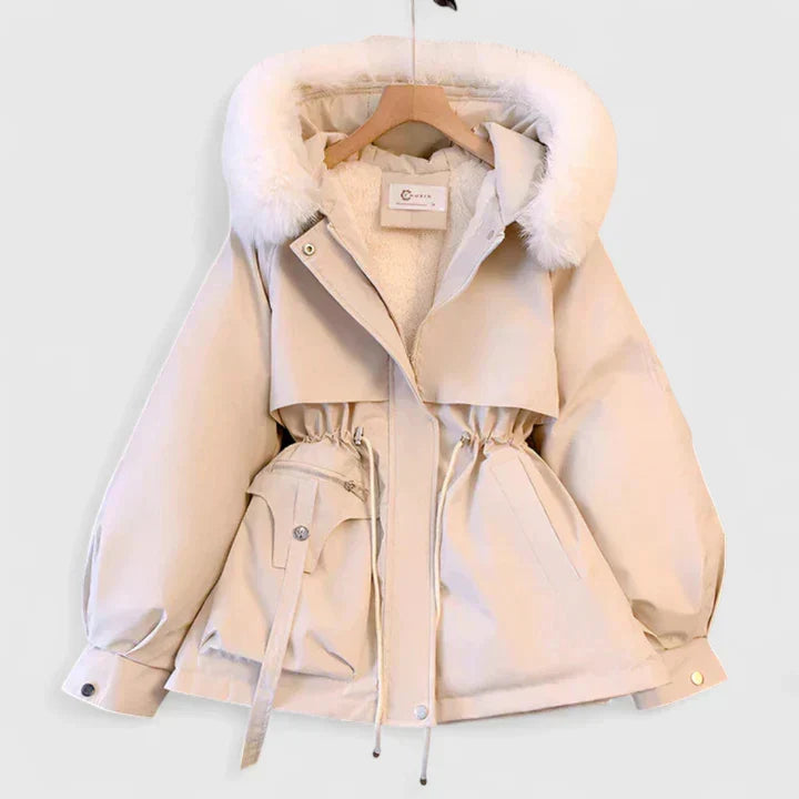 Elegant women's winter jacket, stylish and warm for cold weather, featuring a chic design and insulated comfort.