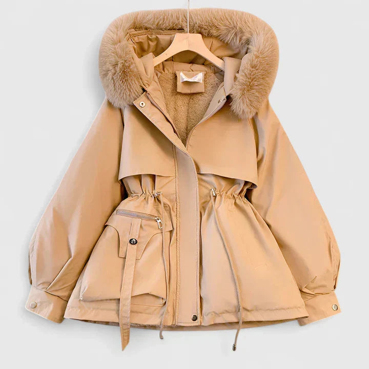 Stylish padded women's winter jacket, insulated for warmth. Elegant outerwear for fashion-conscious women.