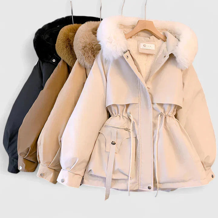 Women's elegant insulated jacket, designed for a flattering fit. Warm, windproof, and stylish for winter fashion.