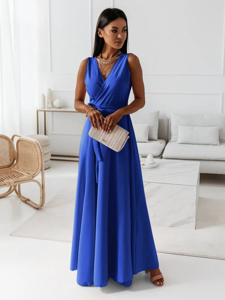Elegant formal women's wrap maxi dress. Sophisticated long evening gown, perfect for wedding guest or party.