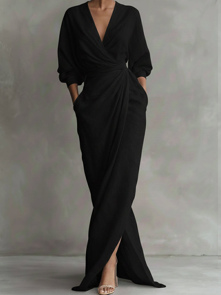 Chic women's wrap maxi dress with V-neck & three-quarter sleeves, great for versatile evening or casual style.