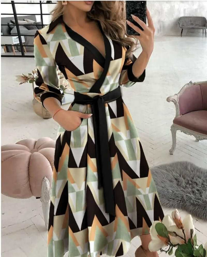 Comfortable women's wrap midi dress. Versatile for casual day wear or elegant daytime events. Flattering fit.