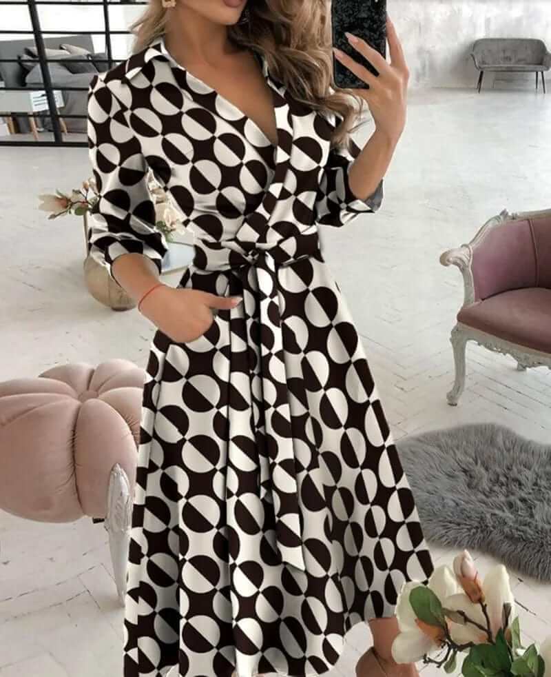 Sophisticated women's elegant wrap midi dress. High-quality fabric, flattering fit for a timeless, chic appeal.
