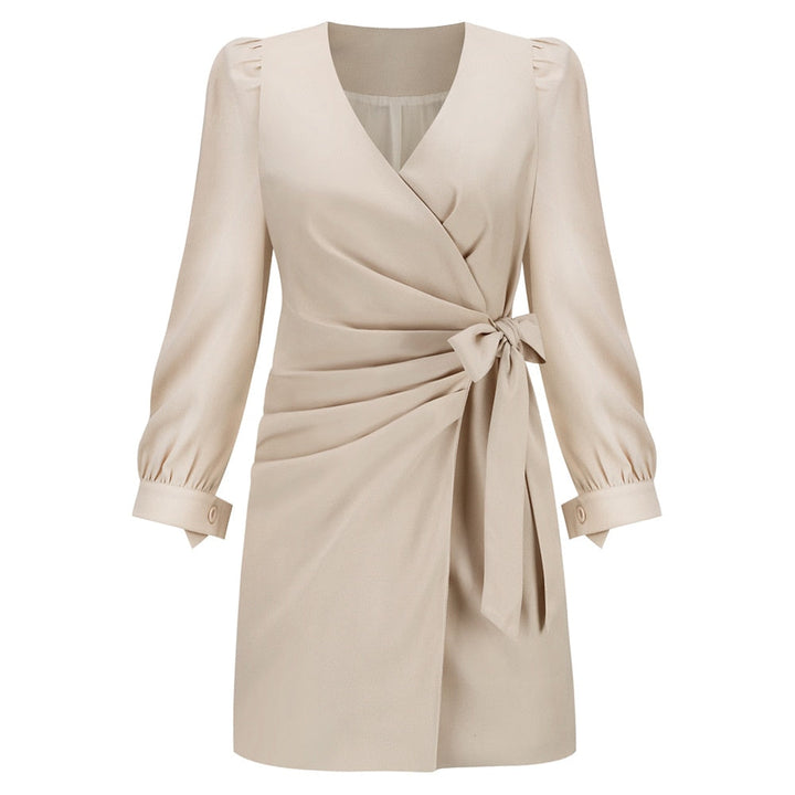 Versatile women's mini wrap dress featuring long sleeves, V-neckline, and a stylish waist tie for fall/spring.