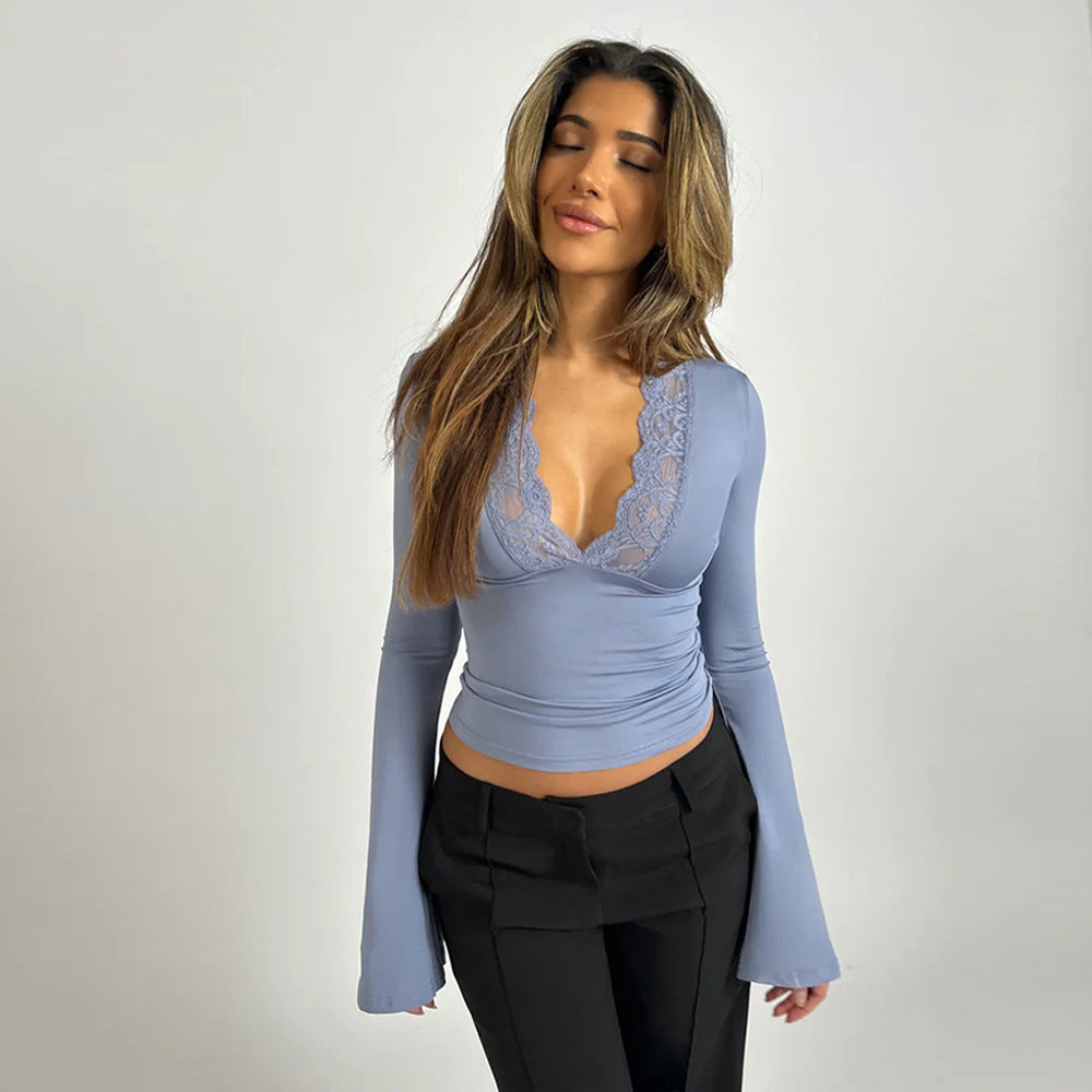 Women's elegant long sleeve lace trim wrap top. Deep V-neck blouse, perfect for evening wear.