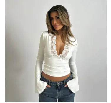 Chic women's long sleeve blouse, featuring a flattering wrap design, deep V-neck, and elegant lace details.