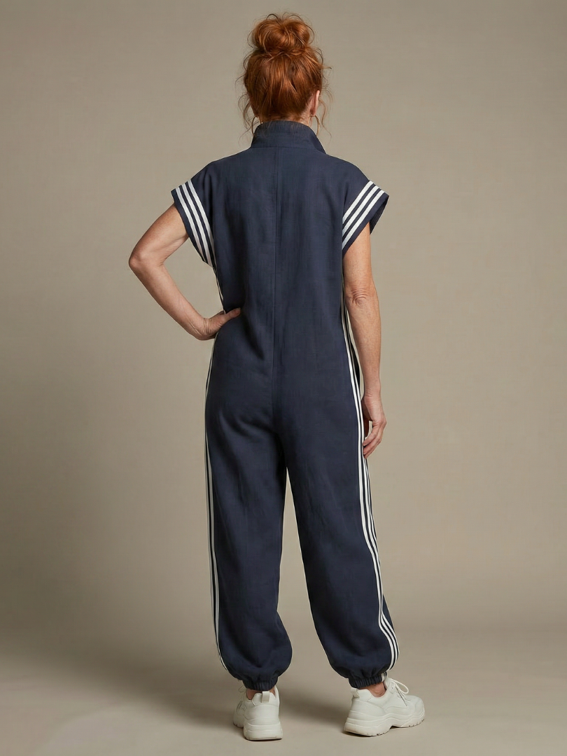 Women's fashion-forward jumpsuit: relaxed fit, zip front, striped details, wide leg & cap sleeve.