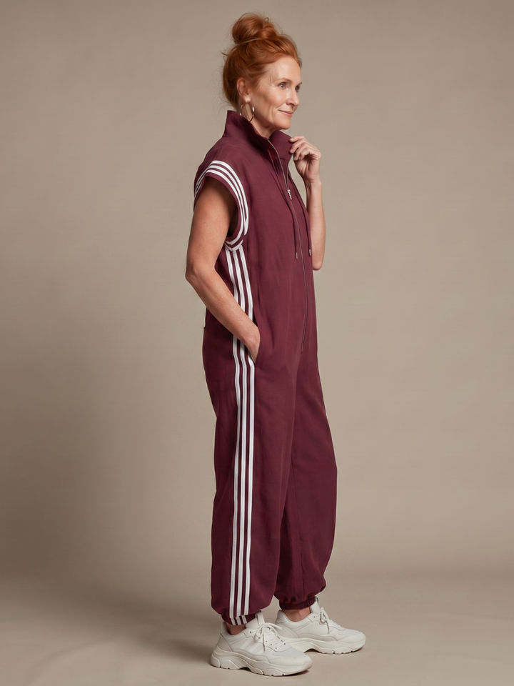 Women's fashion jumpsuit: chic zip front, striped panels, relaxed fit, cap sleeves & wide leg.