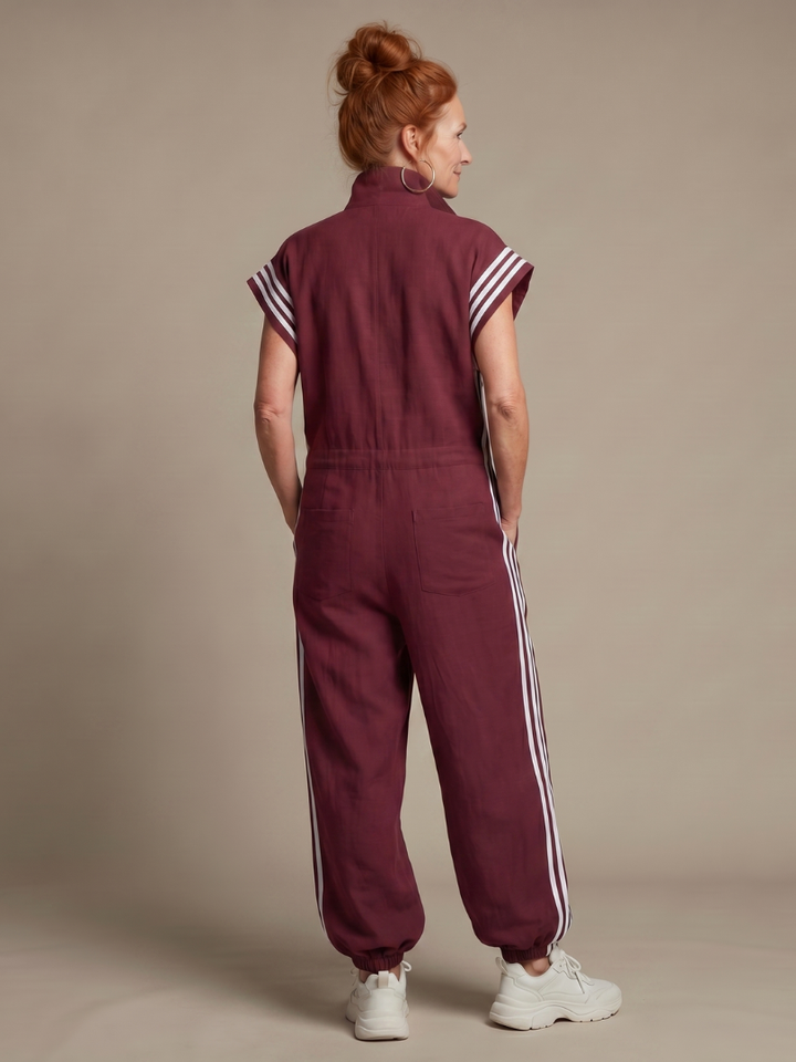 Casual yet elegant women's jumpsuit with a practical zip front, trendy striped panels & wide leg.
