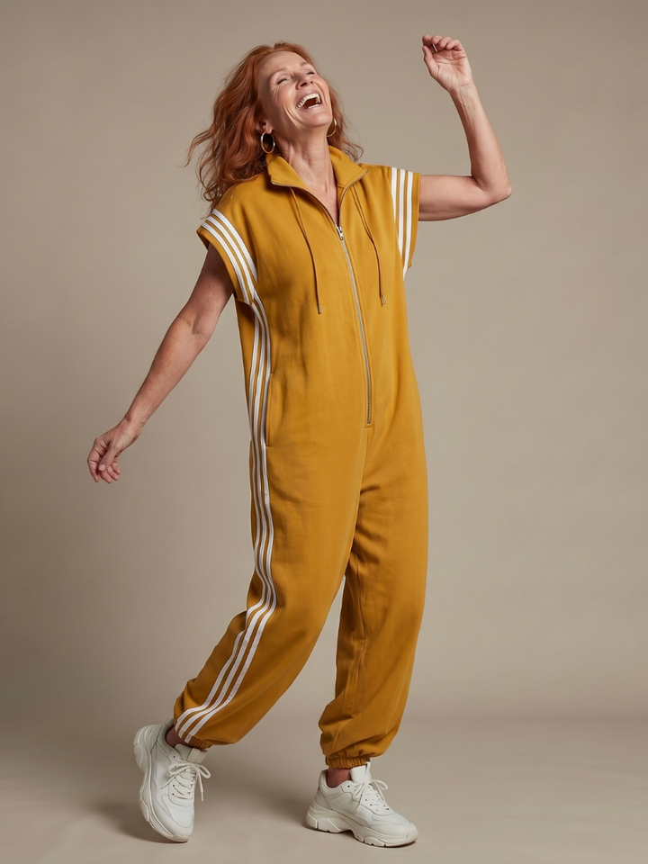 Chic women's striped panel jumpsuit with a zip front, wide leg design & comfortable relaxed fit.