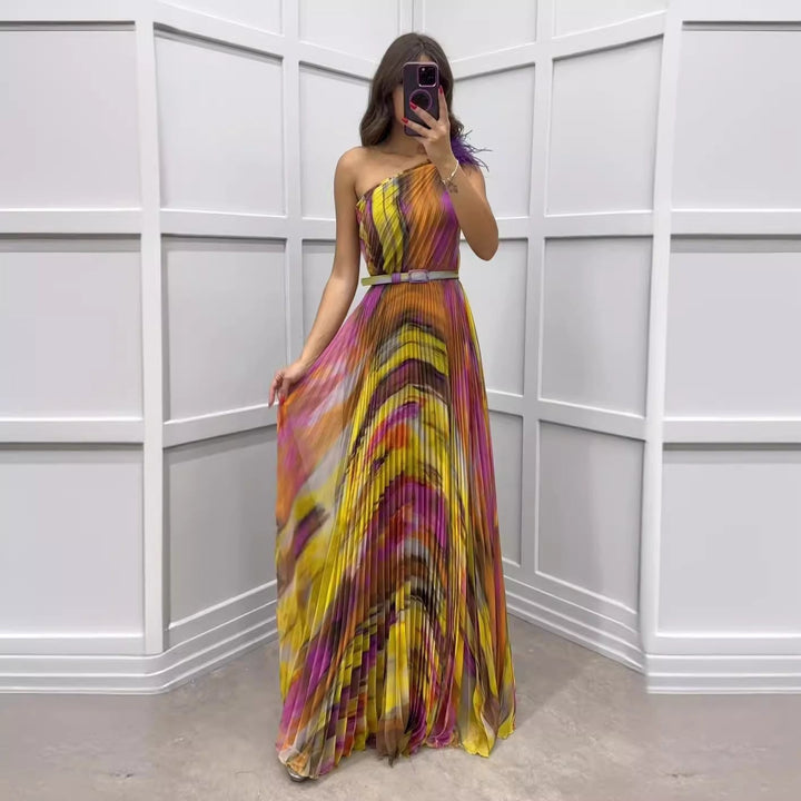 Elegant yellow asymmetric strap pleated maxi dress for women, perfect as a wedding guest or formal occasion wear.