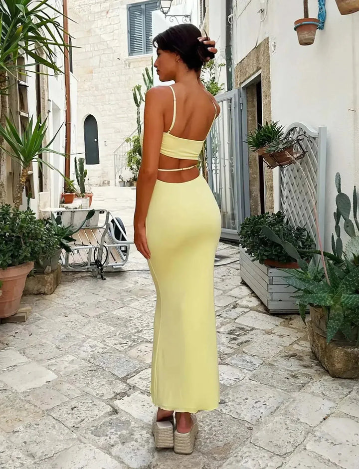 Stunning yellow bodycon maxi dress with an elegant backless design